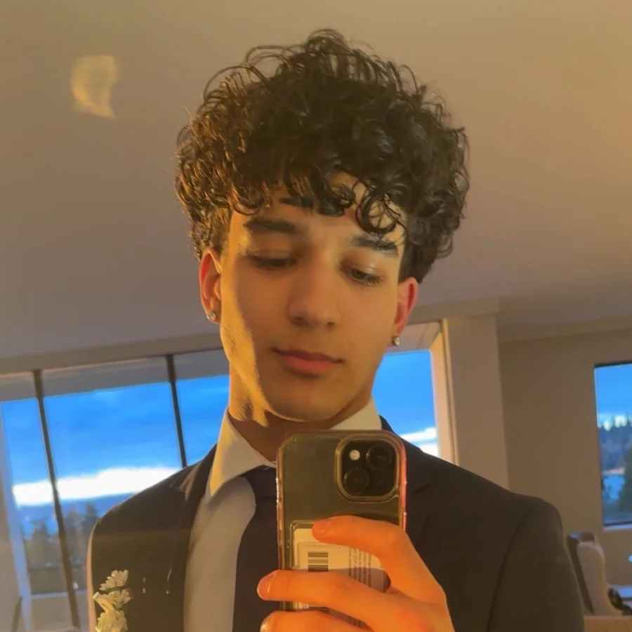Mani Rahnama in a navy suit